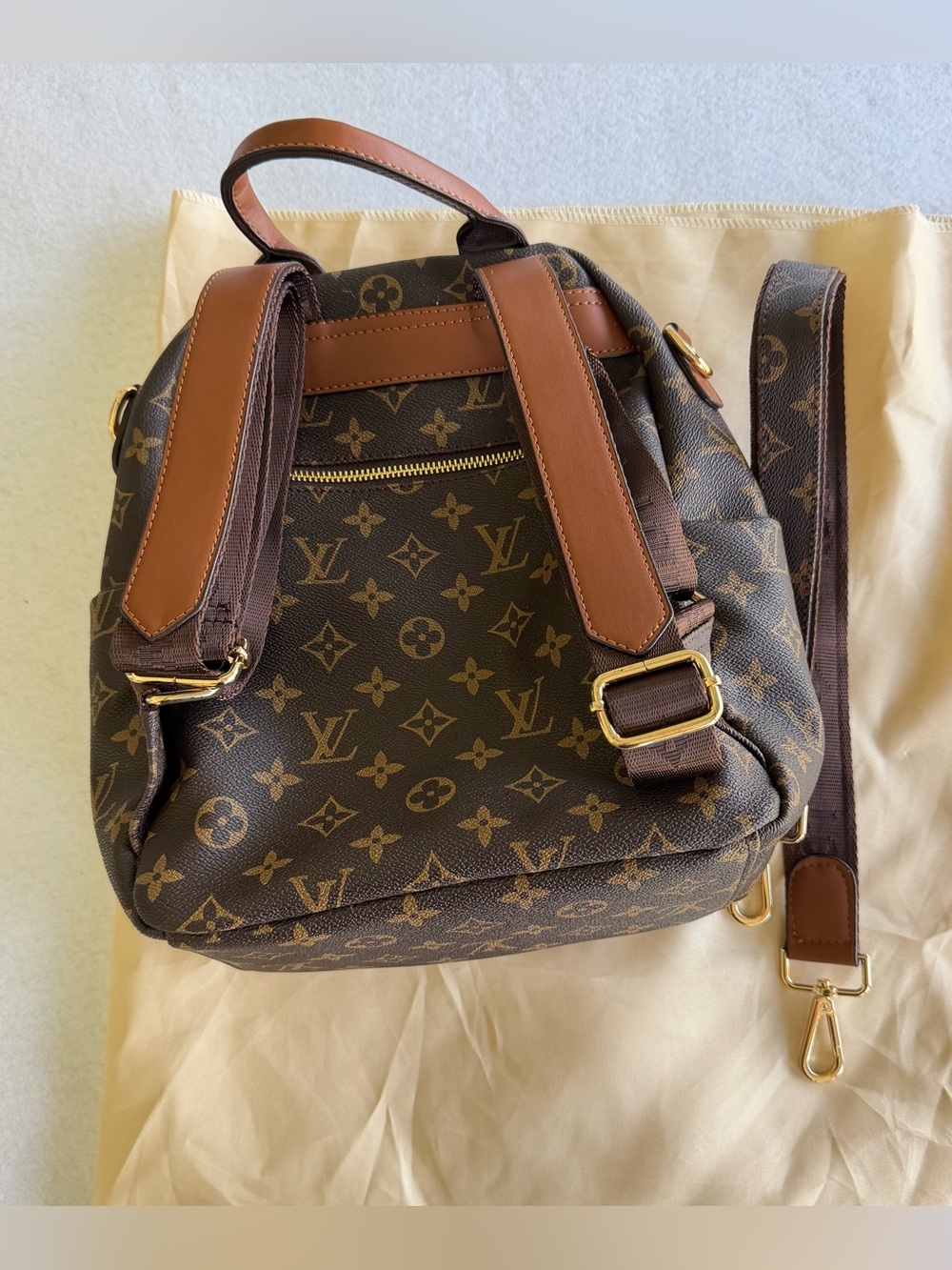 Brown Fashion Multi Pocket Mini
Backpack with Gold Hardware and Faux leather - Picture 3 of 8
